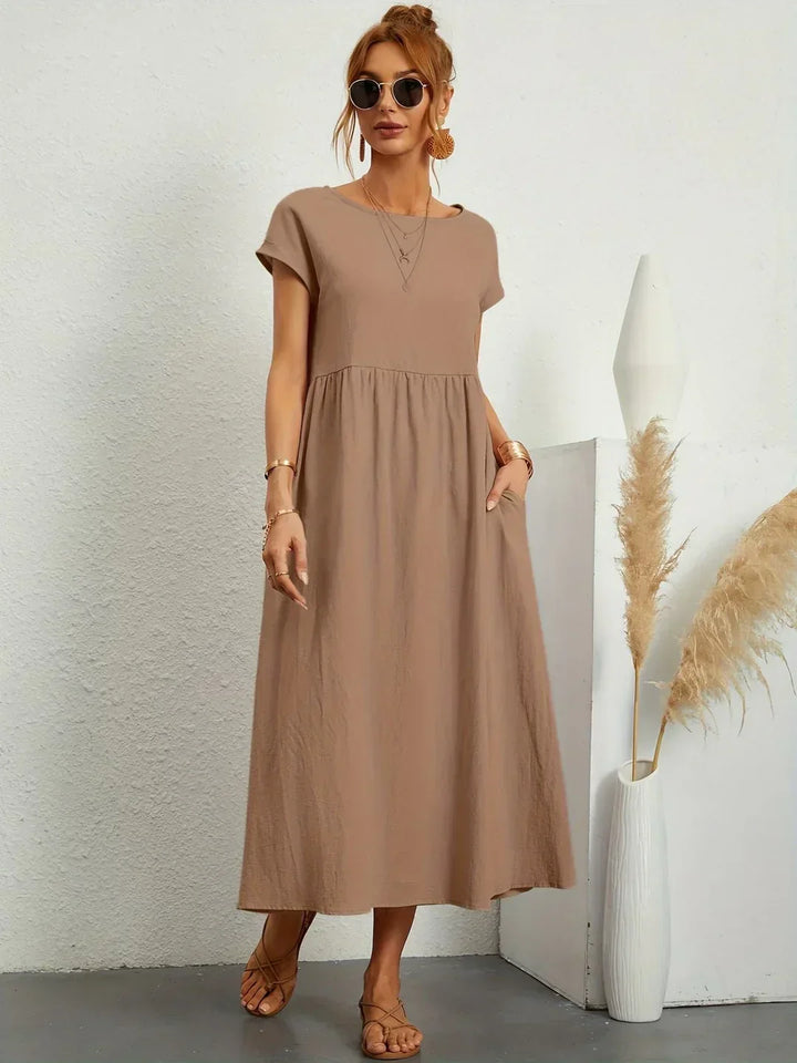 Lucyna - Midi sukienka w płynnej elegancji ponadczasowej