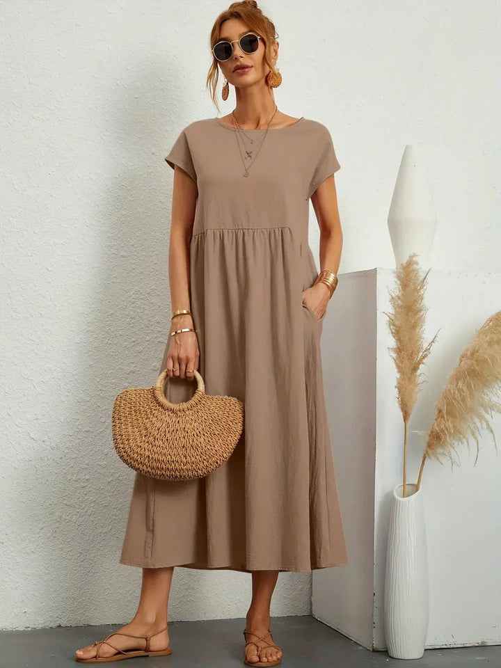 Lucyna - Midi sukienka w płynnej elegancji ponadczasowej