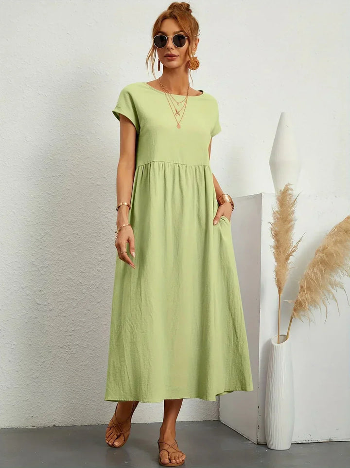 Lucyna - Midi sukienka w płynnej elegancji ponadczasowej