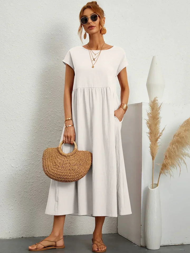Lucyna - Midi sukienka w płynnej elegancji ponadczasowej